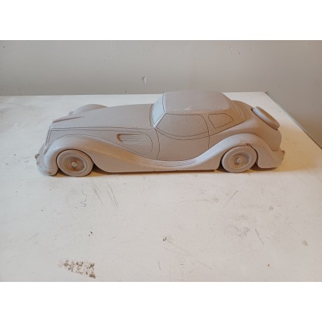 Voiture " Jaguar " en Pierre , travail de Compagnon .